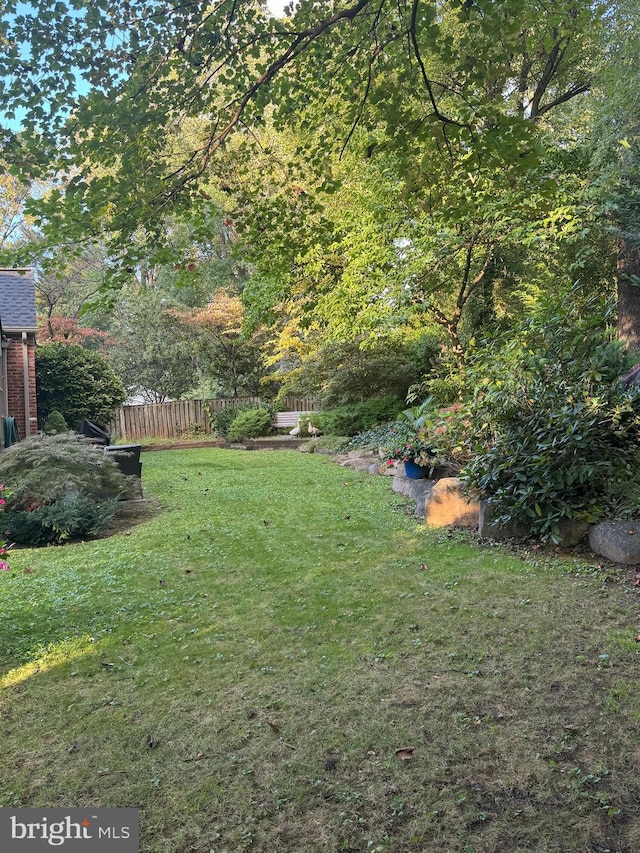 view of yard featuring fence