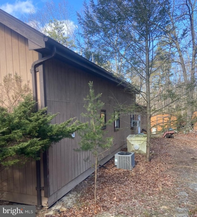 view of home's exterior with cooling unit