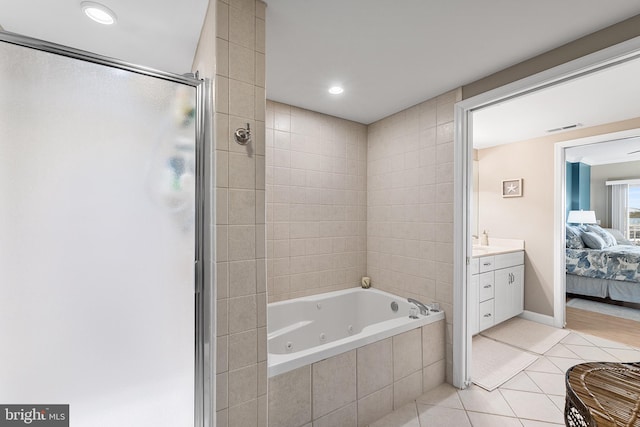 full bathroom featuring ensuite bathroom, visible vents, a shower stall, tile patterned floors, and a tub with jets