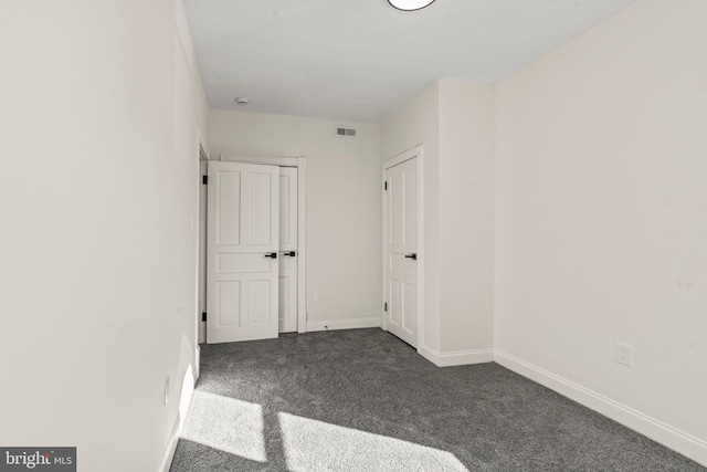 interior space with visible vents and baseboards