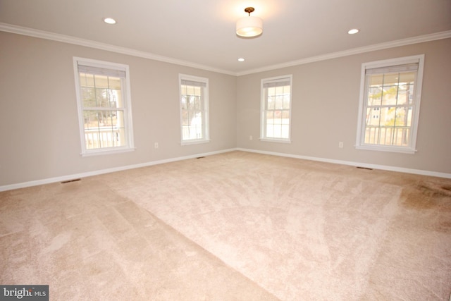 unfurnished room with baseboards, recessed lighting, carpet flooring, and crown molding