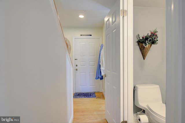 hallway with light wood-type flooring