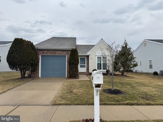 view of front of house featuring brick siding, a shingled roof, concrete driveway, an attached garage, and a front lawn