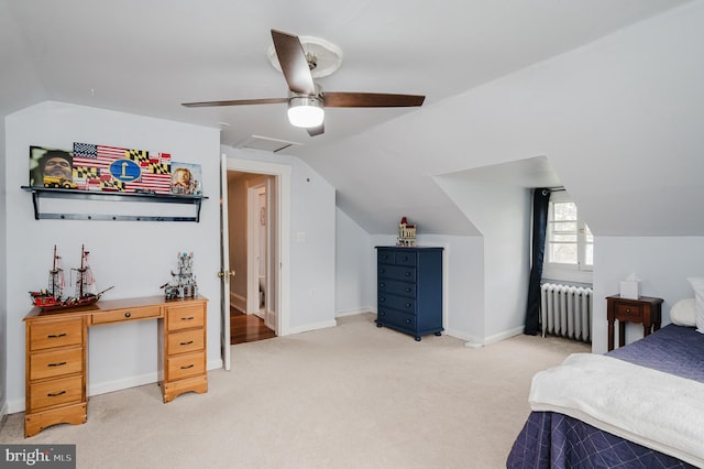 bedroom featuring light carpet, radiator heating unit, lofted ceiling, baseboards, and ceiling fan