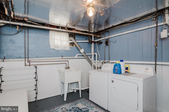 washroom with washer and dryer and laundry area