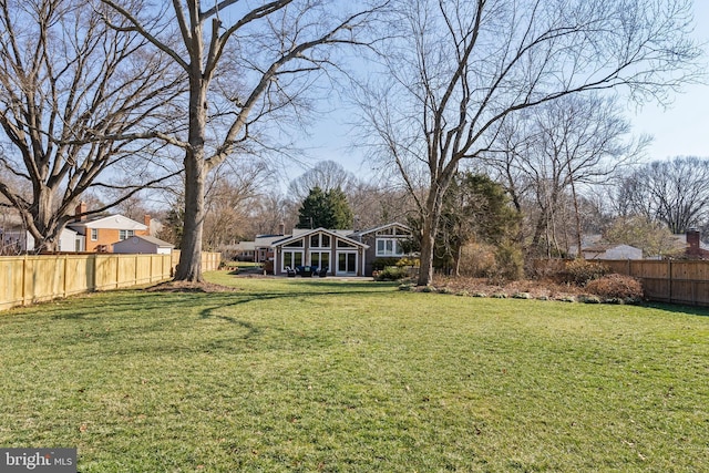 view of yard featuring a fenced backyard