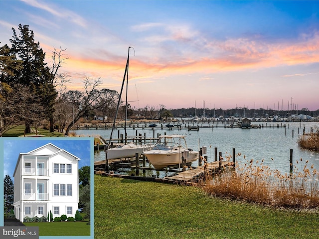 dock area with a lawn, a water view, and boat lift