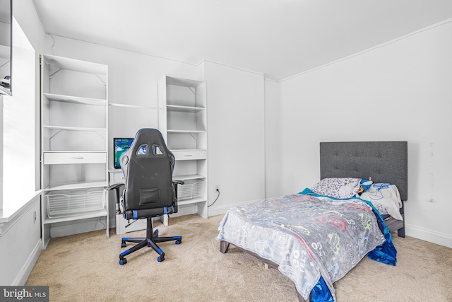 carpeted bedroom with baseboards