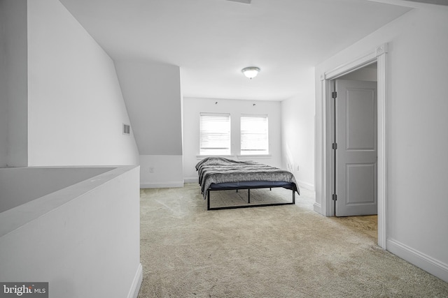 bedroom featuring carpet, visible vents, and baseboards