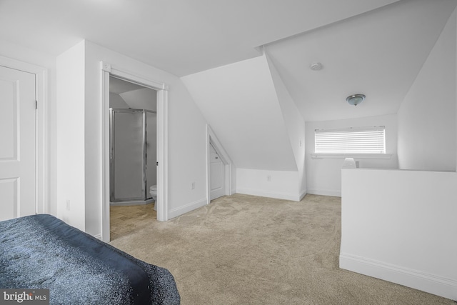 bonus room featuring baseboards, vaulted ceiling, and carpet flooring