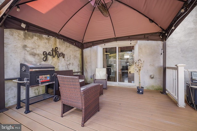 wooden deck with a gazebo