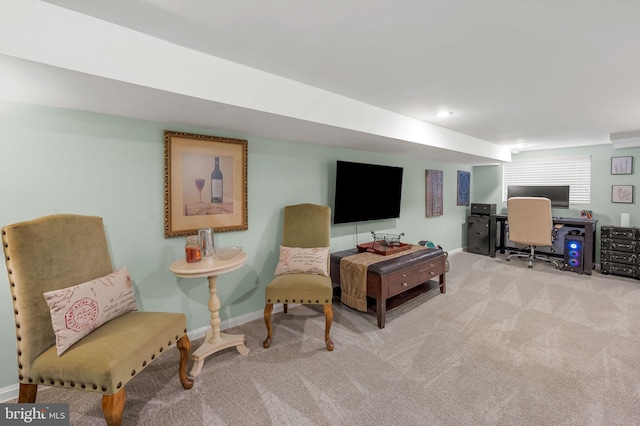 sitting room with carpet floors and baseboards