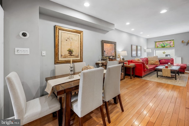 dining area featuring recessed lighting and light wood finished floors