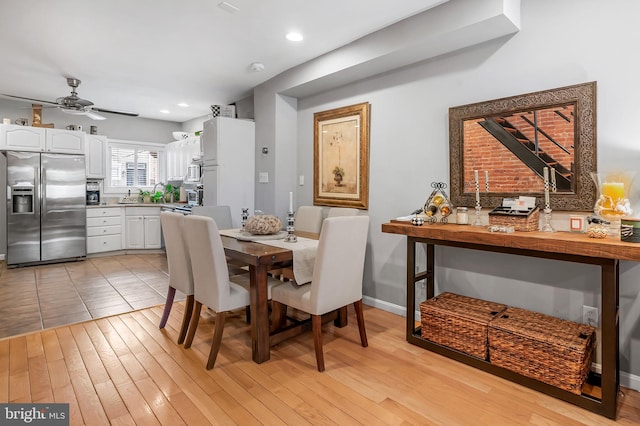 dining area with ceiling fan, light wood finished floors, recessed lighting, and baseboards