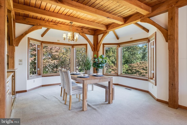 5112 Shore Dr, Huntingtown, MD 20639 - unfurnished dining area with light carpet, a notable chandelier, beamed ceiling, and baseboards