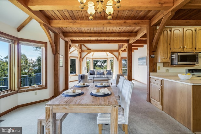 5112 Shore Dr, Huntingtown, MD 20639 - dining space featuring light carpet, baseboards, lofted ceiling with beams, and an inviting chandelier
