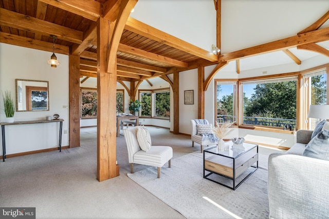 5112 Shore Dr, Huntingtown, MD 20639 - carpeted living room with baseboards and beam ceiling