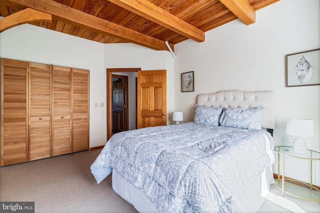 5112 Shore Dr, Huntingtown, MD 20639 - bedroom featuring a closet, carpet floors, wood ceiling, and vaulted ceiling with beams