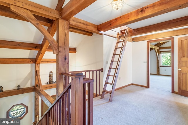5112 Shore Dr, Huntingtown, MD 20639 - corridor featuring beamed ceiling, light carpet, baseboards, and an upstairs landing