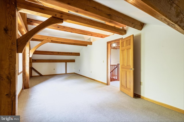 5112 Shore Dr, Huntingtown, MD 20639 - additional living space with baseboards, light colored carpet, and vaulted ceiling with beams