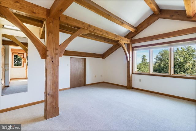5112 Shore Dr, Huntingtown, MD 20639 - additional living space featuring arched walkways, baseboards, carpet, and vaulted ceiling with beams