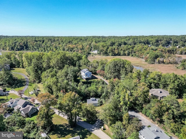 5112 Shore Dr, Huntingtown, MD 20639 - birds eye view of property with a wooded view