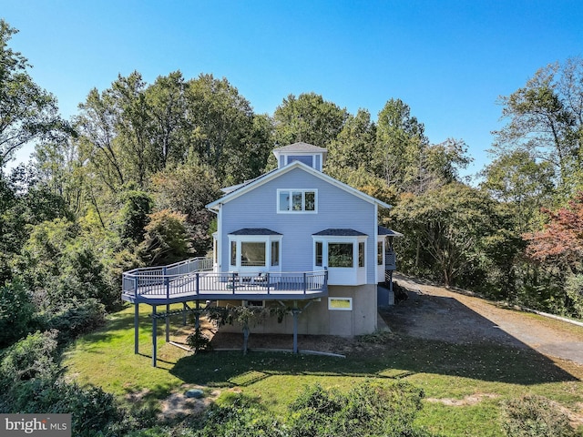 5112 Shore Dr, Huntingtown, MD 20639 - back of property with a lawn and a deck