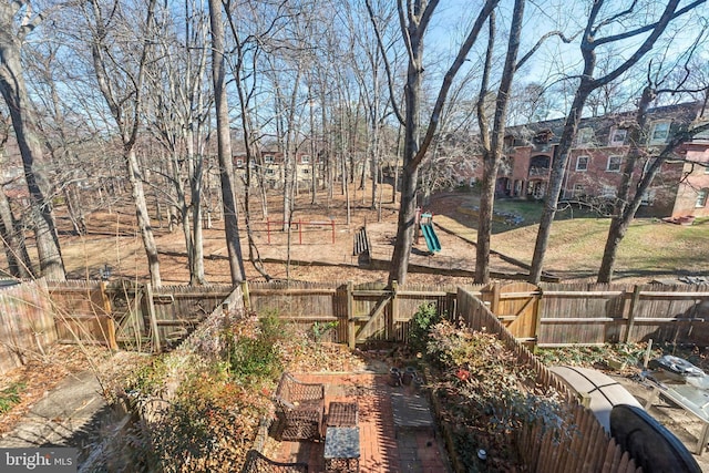 view of yard with a fenced backyard