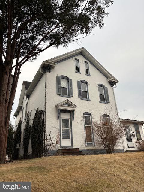 italianate house with a front yard