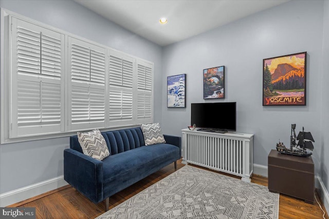 2652 Woodley Pl NW, Washington, DC 20008 - living area featuring baseboards, wood finished floors, and recessed lighting
