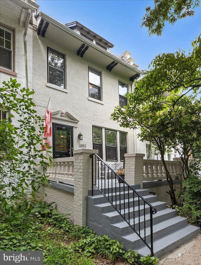 2652 Woodley Pl NW, Washington, DC 20008 - view of front facade featuring stucco siding