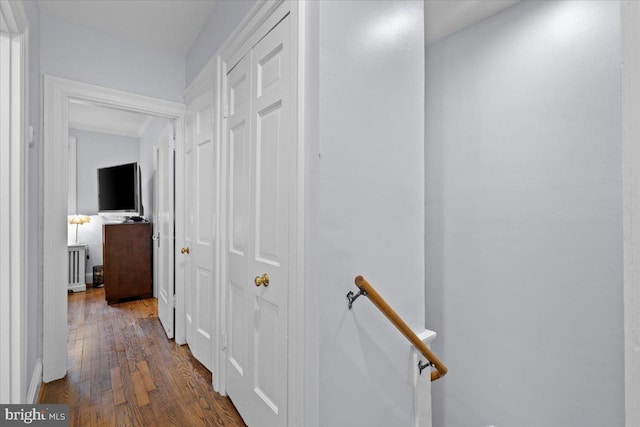 2652 Woodley Pl NW, Washington, DC 20008 - corridor featuring dark wood-style flooring, an upstairs landing, and crown molding