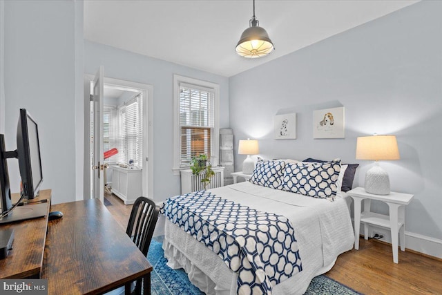 2652 Woodley Pl NW, Washington, DC 20008 - bedroom with wood finished floors, baseboards, and an office area