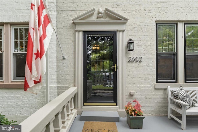 2652 Woodley Pl NW, Washington, DC 20008 - doorway to property with brick siding