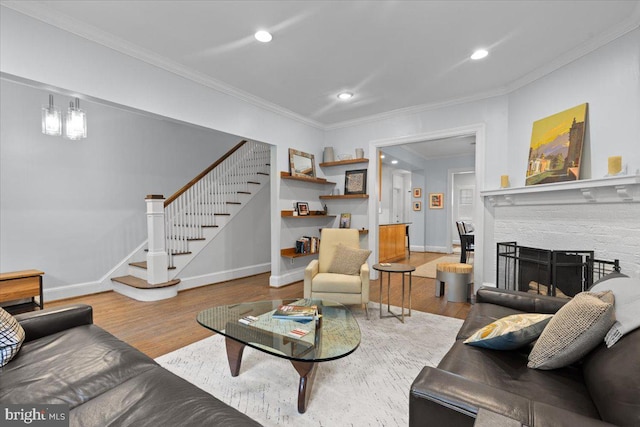 2652 Woodley Pl NW, Washington, DC 20008 - living area featuring stairs, wood finished floors, baseboards, ornamental molding, and recessed lighting