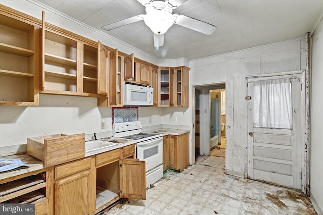 kitchen with white appliances, a ceiling fan, glass insert cabinets, light countertops, and light floors