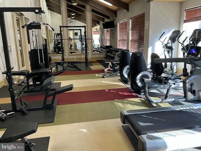 gym with lofted ceiling