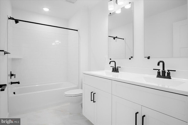 full bathroom featuring marble finish floor, a sink, bathing tub / shower combination, and double vanity