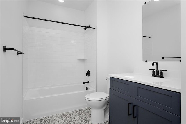 bathroom with tile patterned floors, vanity, toilet, and shower / bathtub combination