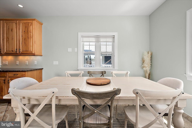 dining area featuring recessed lighting