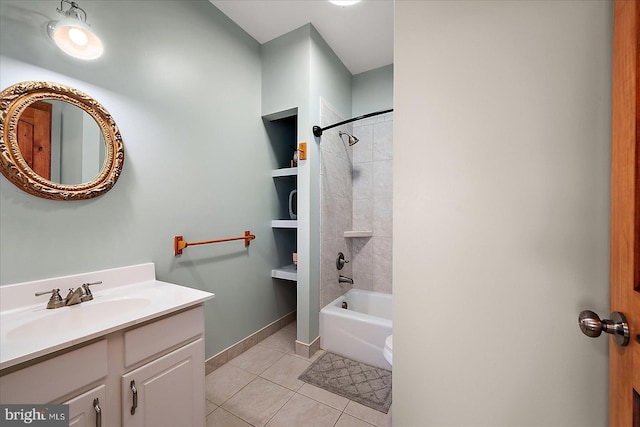 bathroom featuring baseboards, shower / washtub combination, vanity, and tile patterned floors