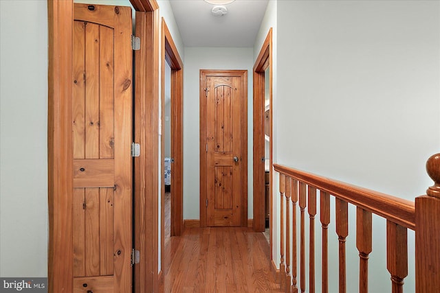 hallway featuring wood finished floors