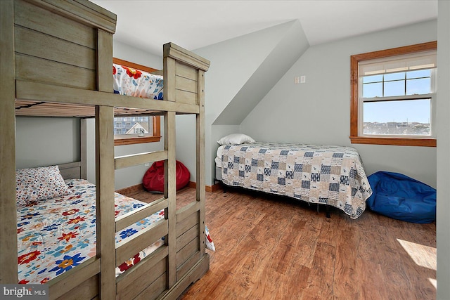 bedroom with wood finished floors