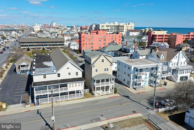 aerial view with a city view and a water view