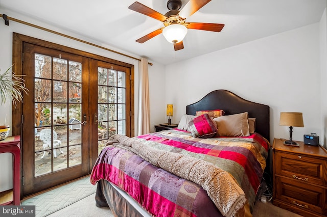 carpeted bedroom with ceiling fan, access to outside, and french doors