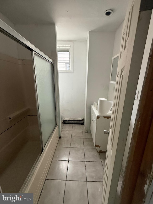 1924 Castor Ave, Philadelphia, PA 19134 - full bathroom with vanity, an enclosed shower, and tile patterned floors
