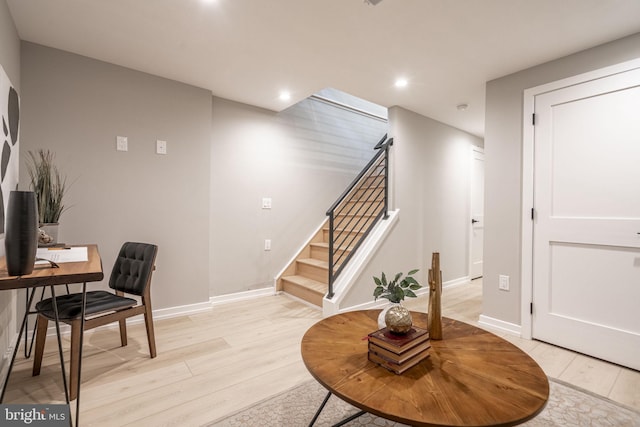 office with light wood-style flooring, baseboards, and recessed lighting