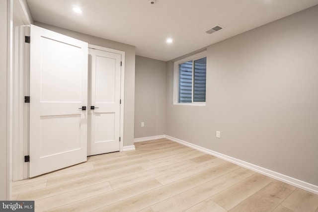 interior space with recessed lighting, visible vents, baseboards, a closet, and light wood-type flooring