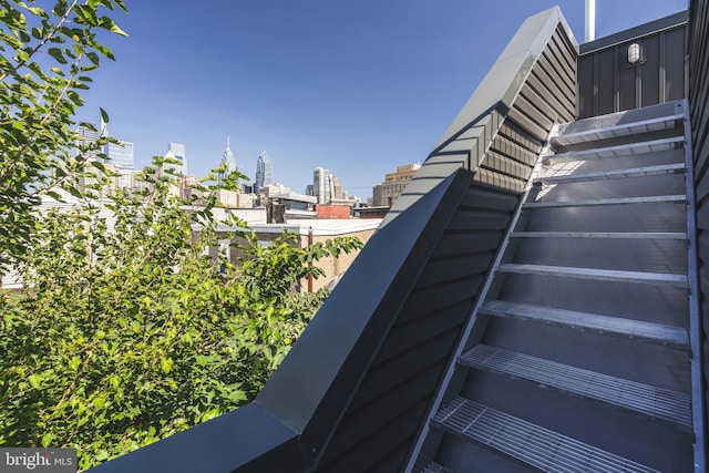 staircase with a view of city