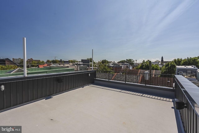 view of patio featuring a balcony